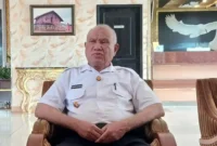 Bupati Kaimana Drs. Hasan Achmad, M.Si, (foto: Tribunnewspapuabarat)